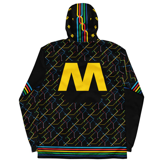 Zwart windjack met een all-over print van het Rotterdamse metro systeem, ontwerp door De Zwarte Markt en verkrijgbaar bij cadeauwinkel 'A Given Horse'. Achterkant.